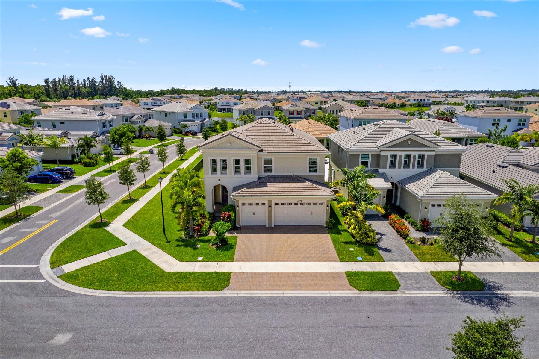 a aerial view of a house with a garden and plants