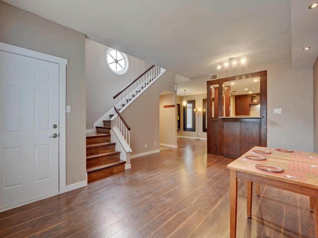 a view of a kitchen cabinets and wooden floor