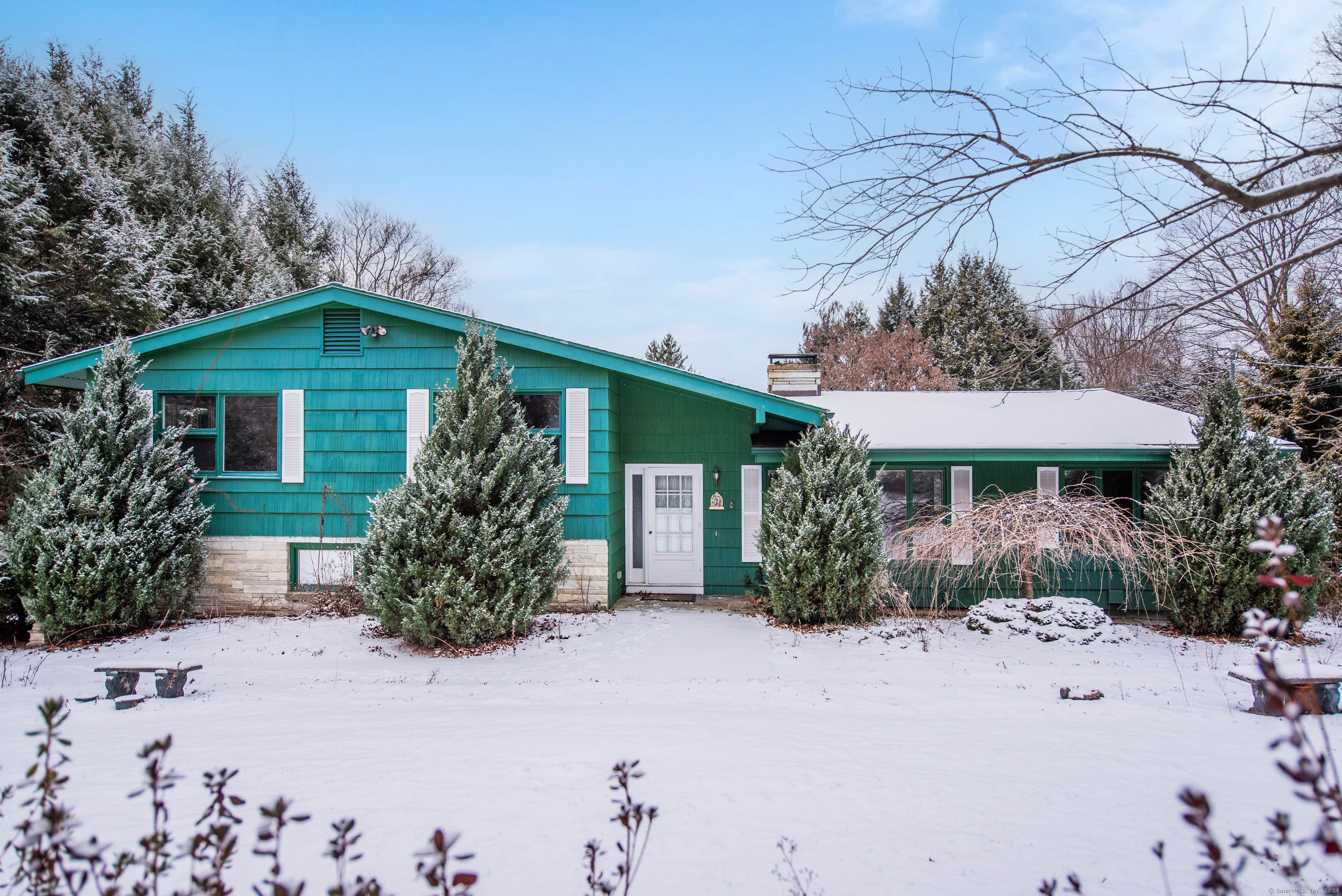 front view of a house with a yard