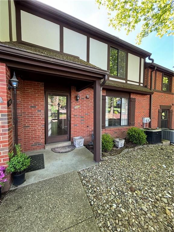 a view of entryway with a front door