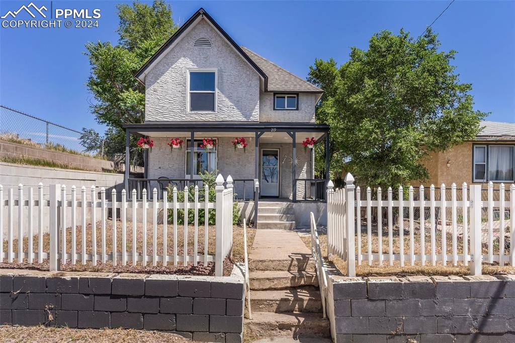 a front view of a house with a porch