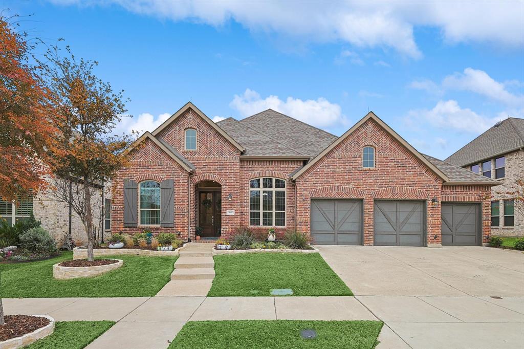 front view of a house and a yard