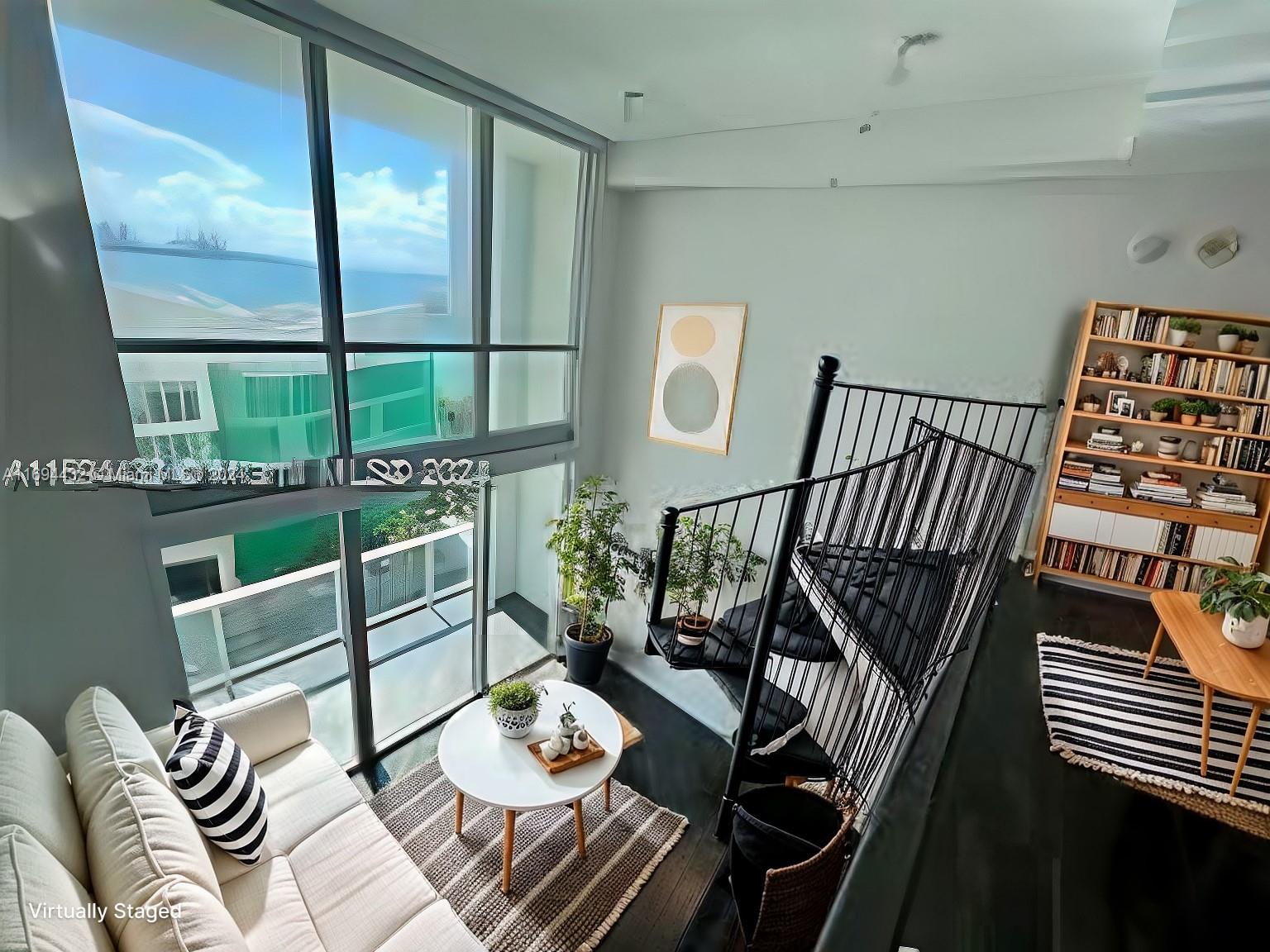 a view of a livingroom with furniture