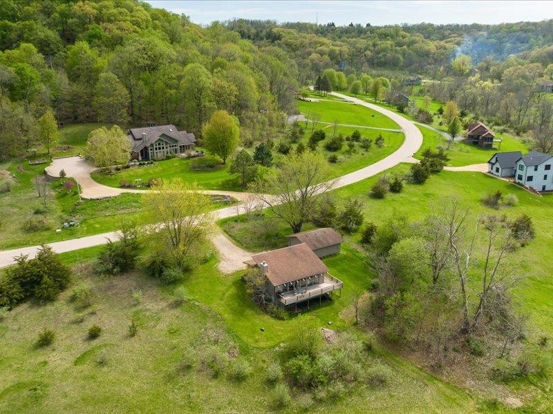 a view of a golf course with swimming pool