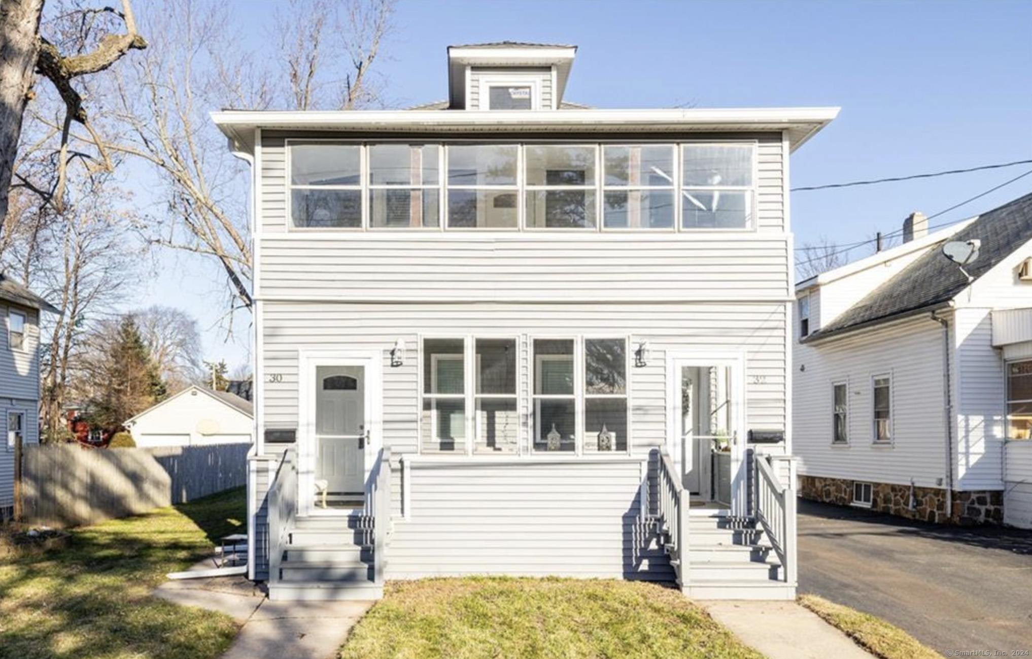 a front view of a house with a balcony