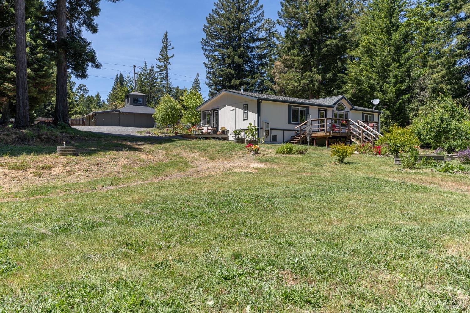 a front view of house with yard and seating area