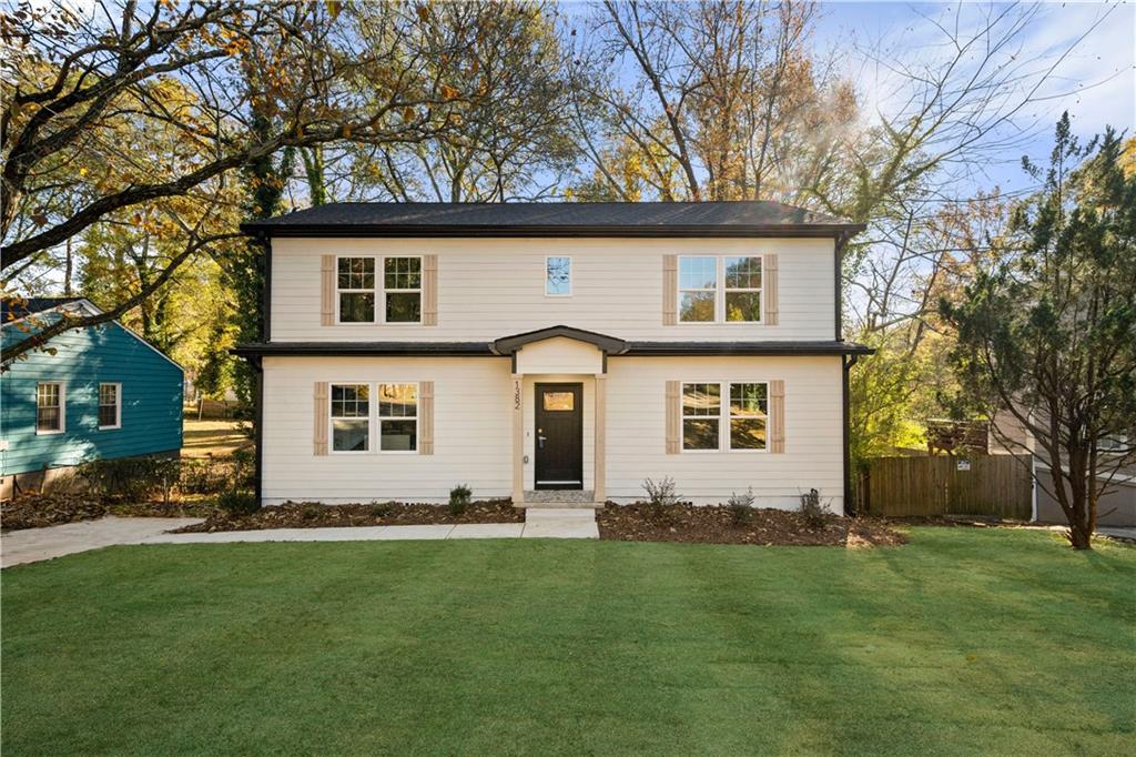 front view of house with a yard