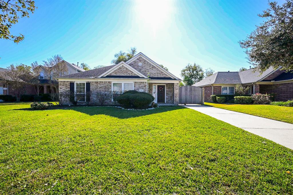 a view of a house with a big yard