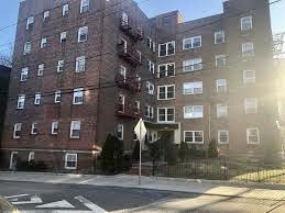 a front view of a brick building