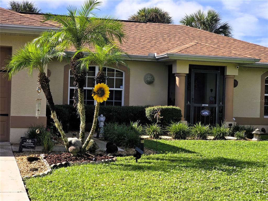 a front view of a house with patio