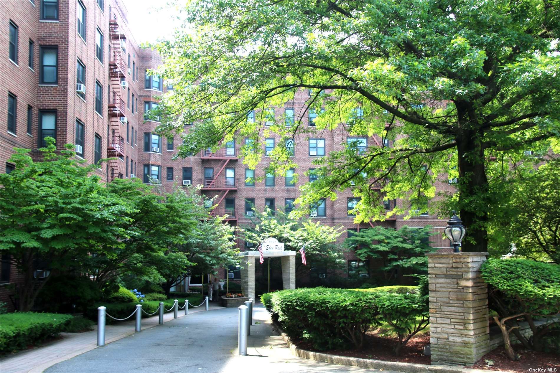 a backyard of a building with trees