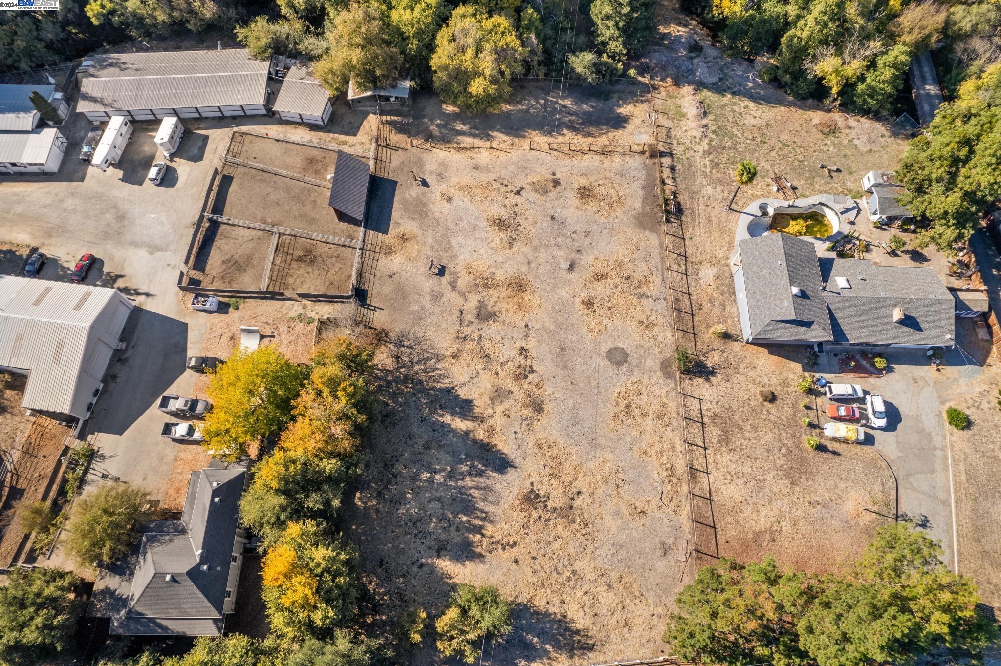 an aerial view of residential house with outdoor space