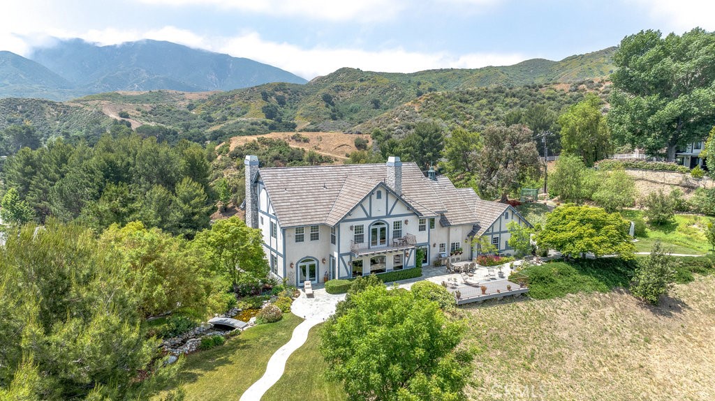 a view of a house with mountain view