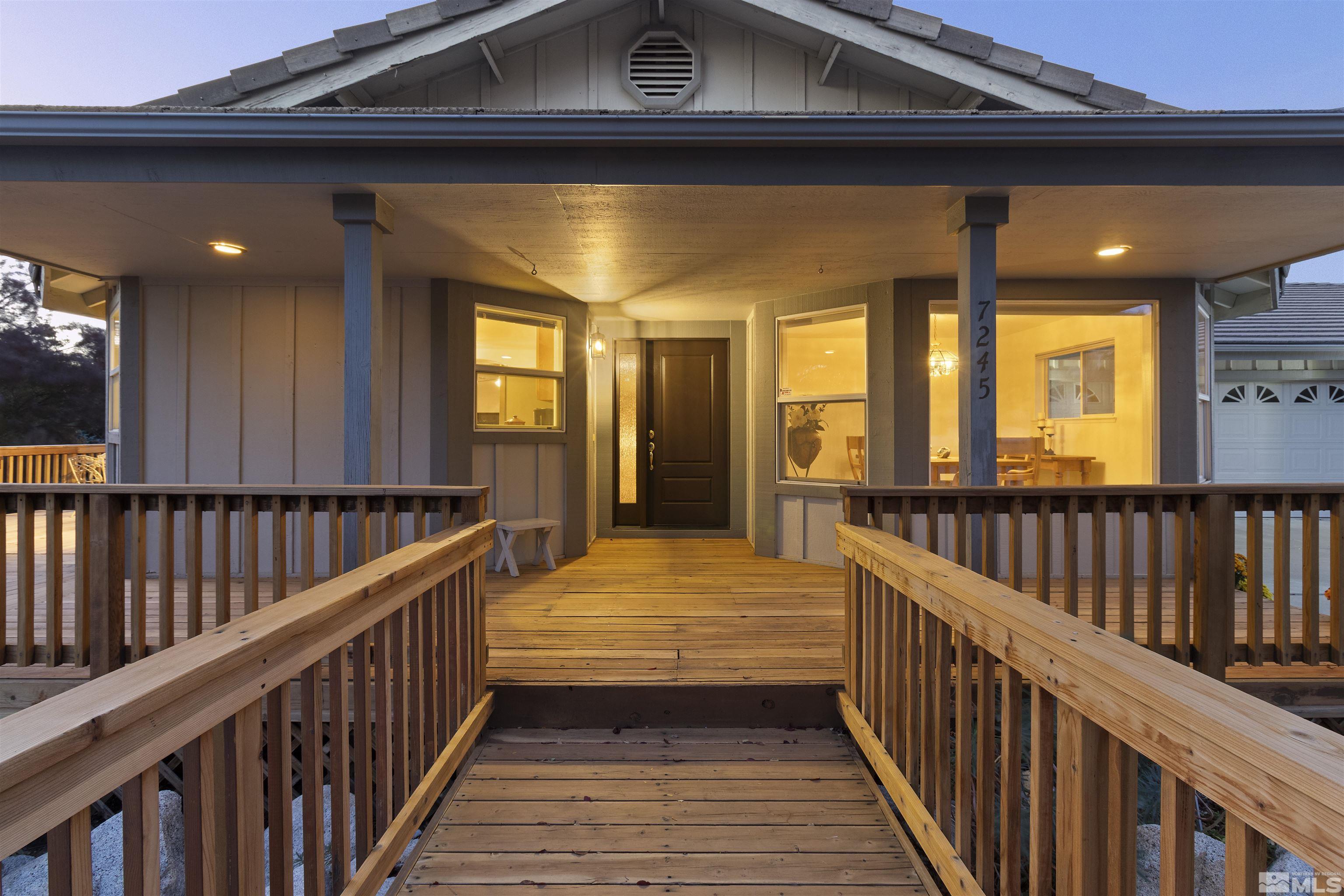 a view of balcony with wooden floor