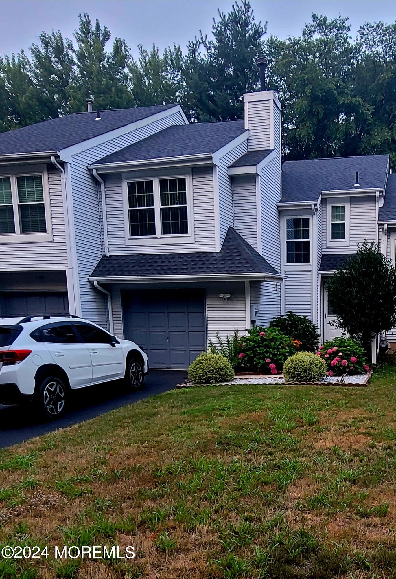 a view of a house with a garden