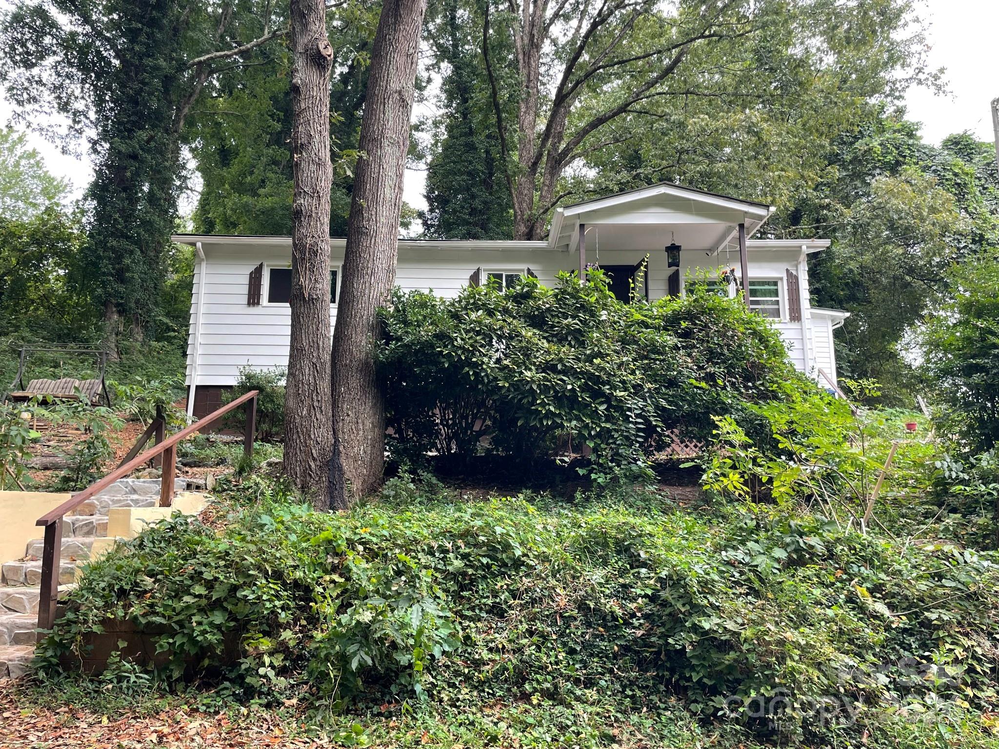 a house view with a garden space