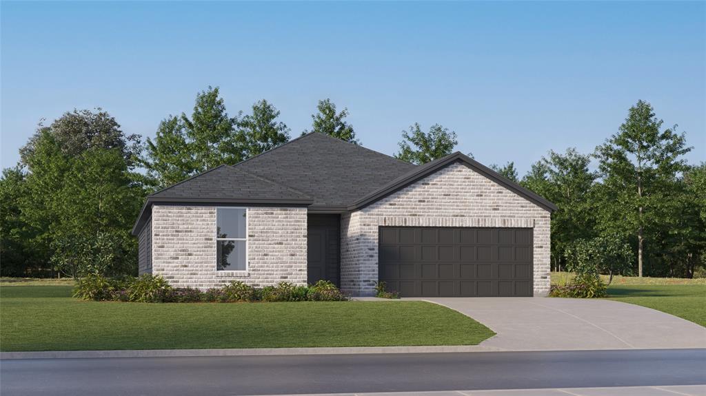 a front view of a house with a garden and yard