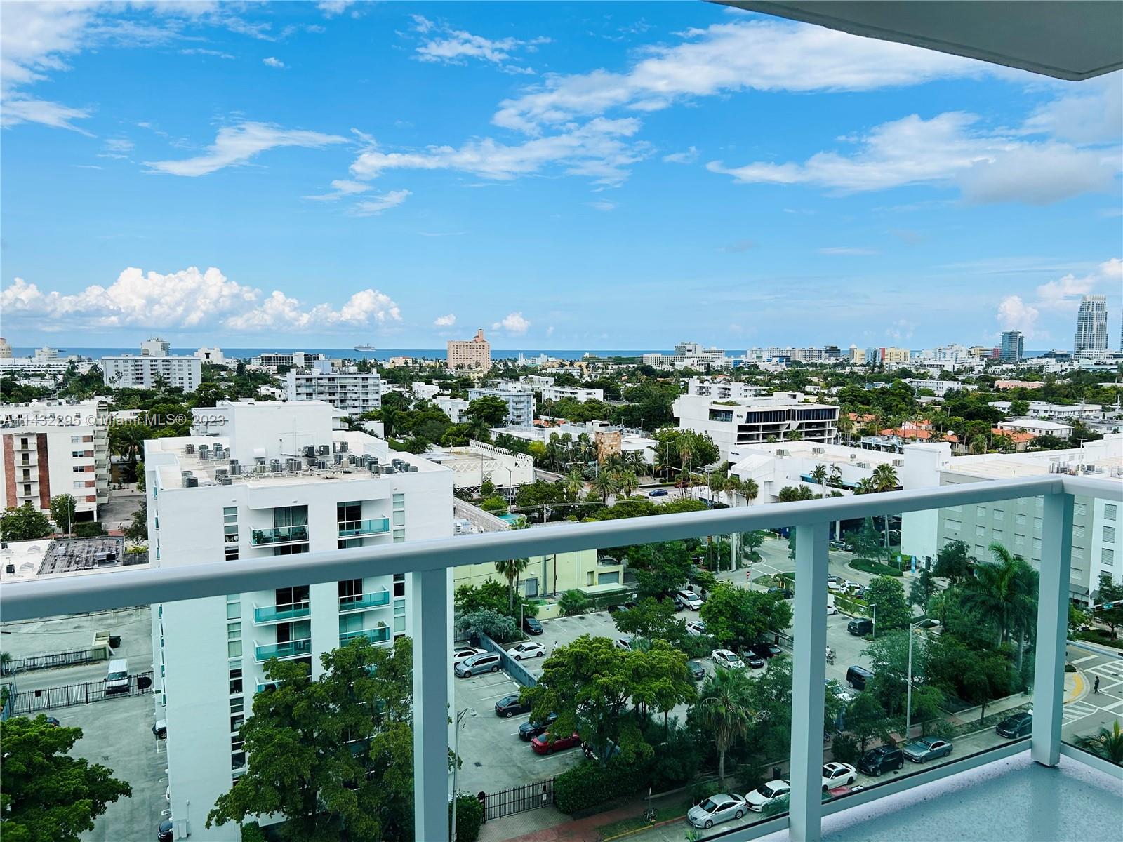 a view of city with tall buildings