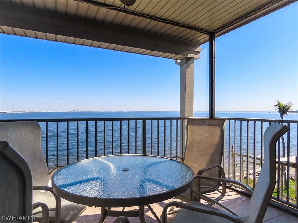 a view of balcony and wooden floor