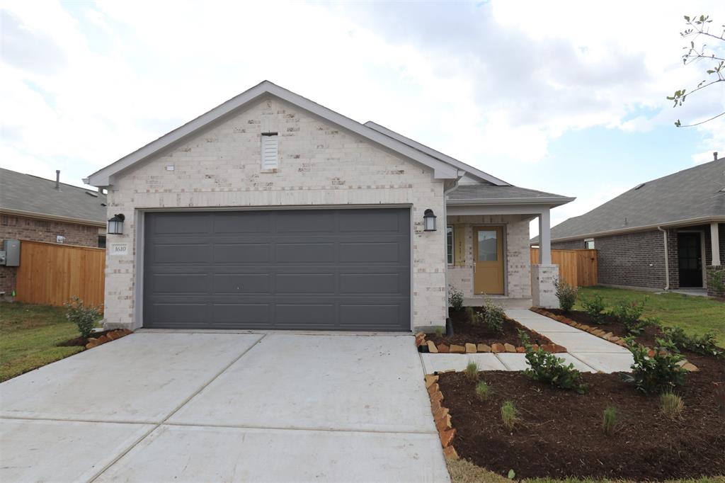 a front view of house with garage