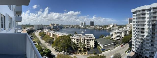 a view of a city with tall buildings