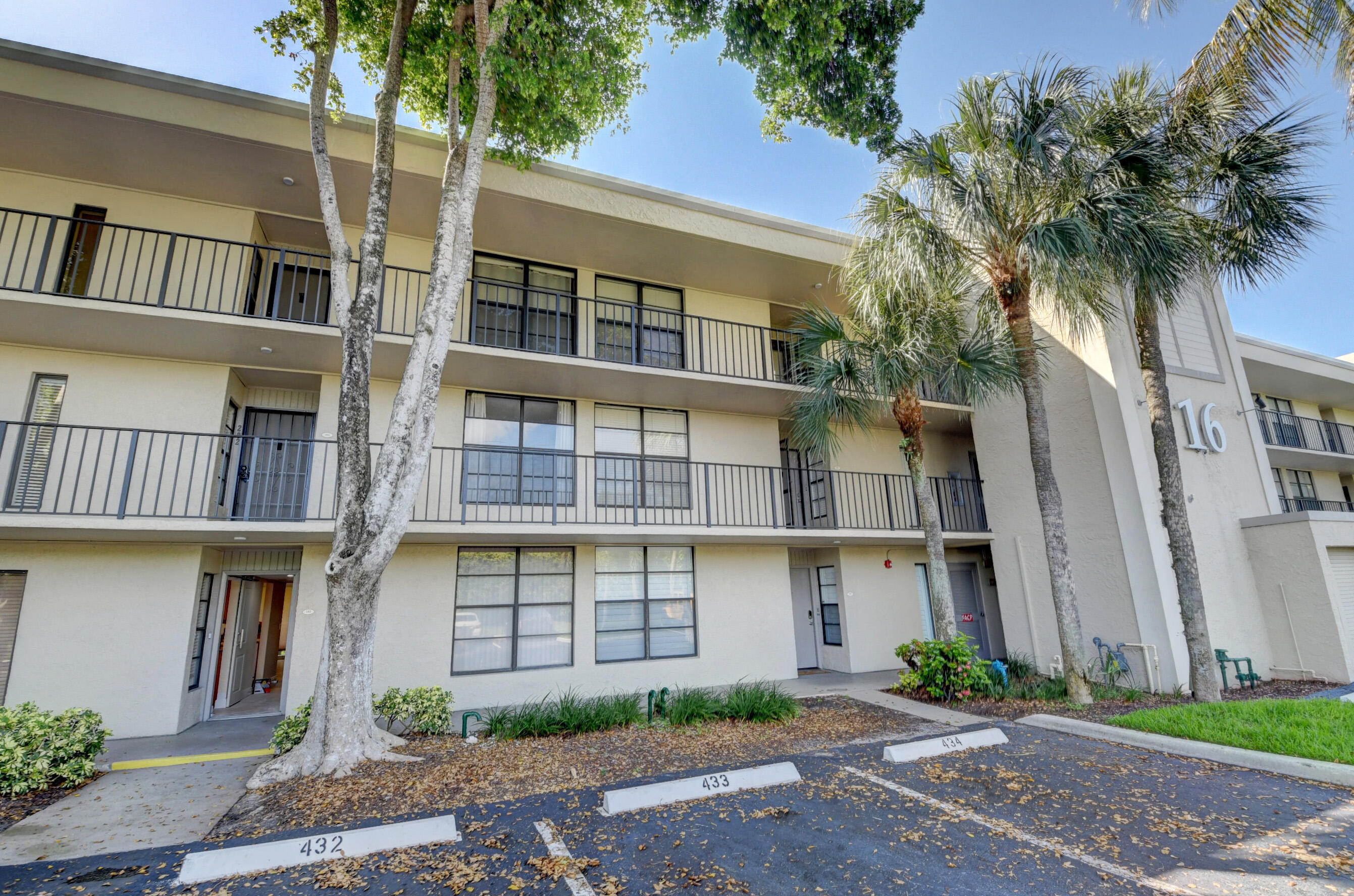 a front view of a multi story residential apartment building