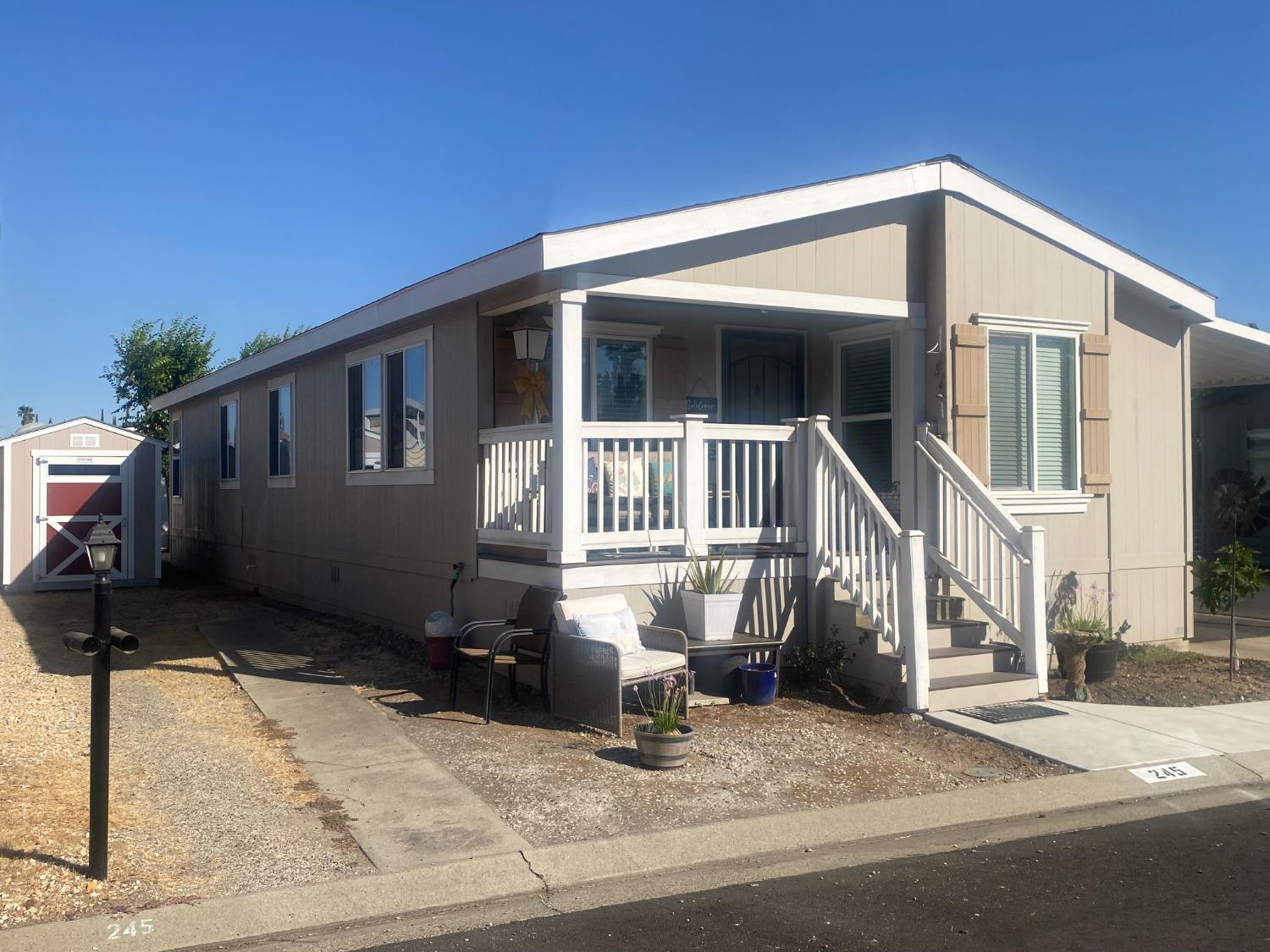 a front view of a house with garage