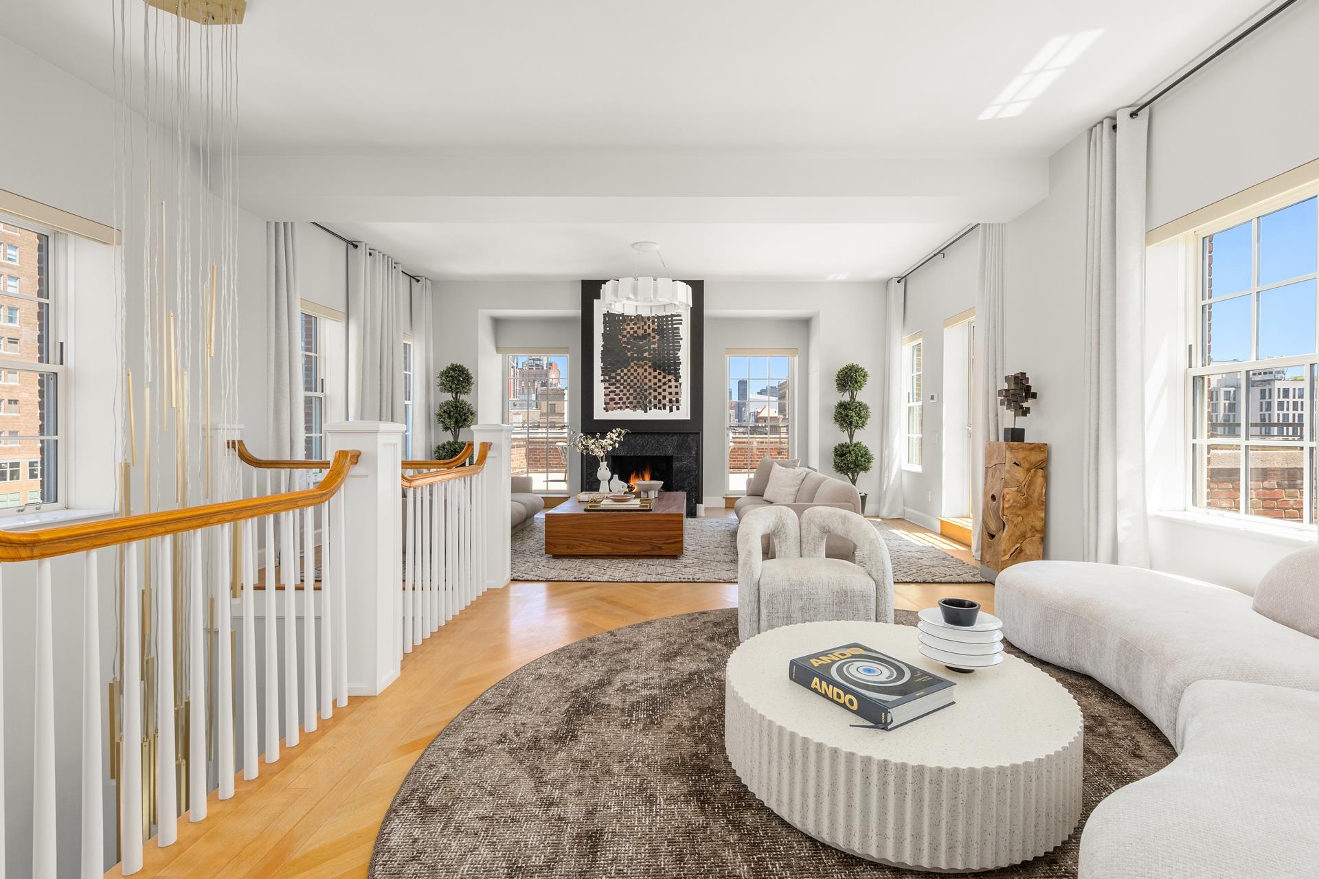 a living room with furniture and a table