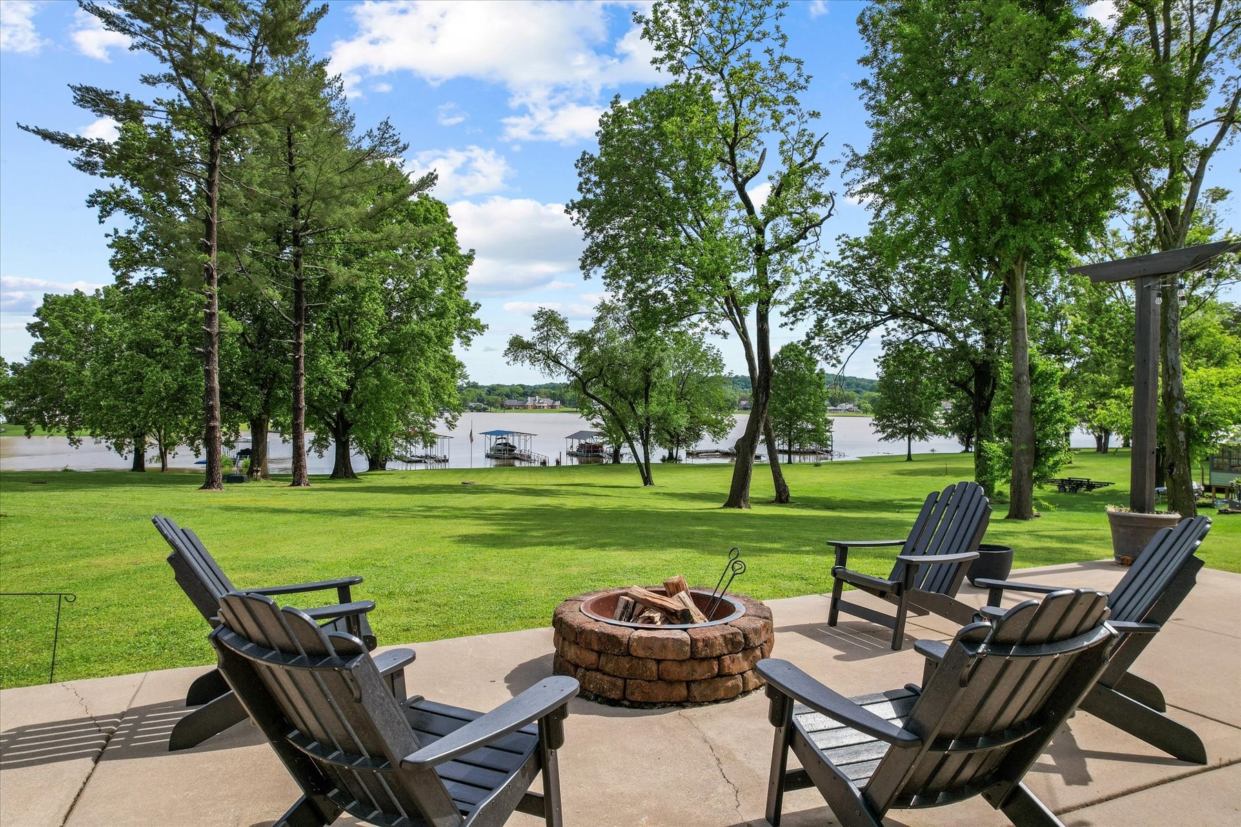 a view of a chairs and table in the yard