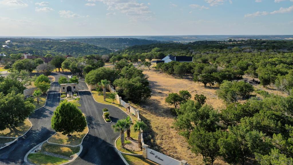 an aerial view of residential house and outdoor space