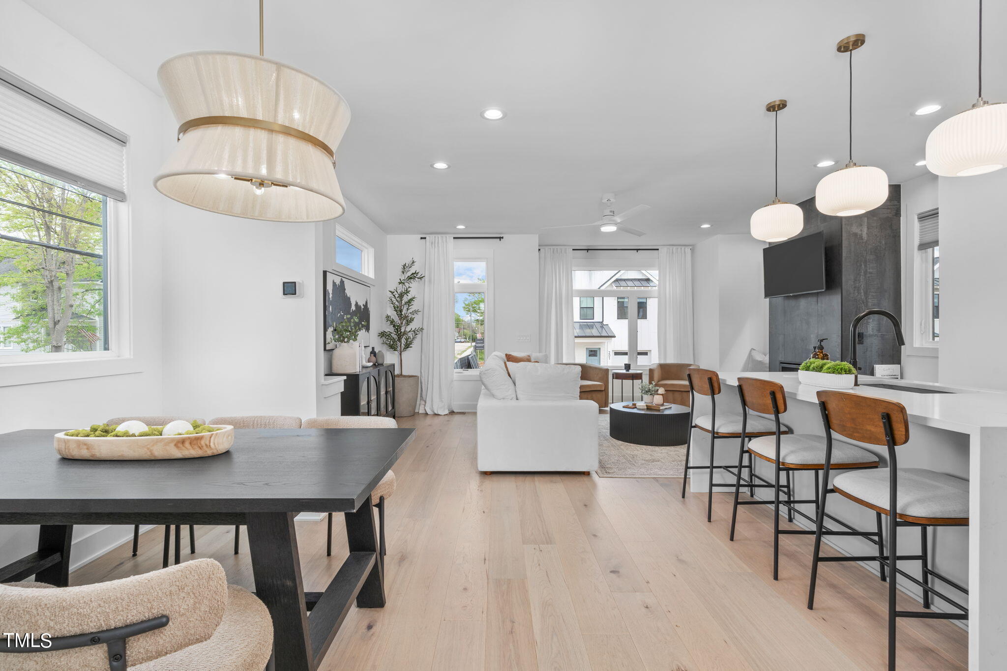 a very nice looking dining room with a table and chairs