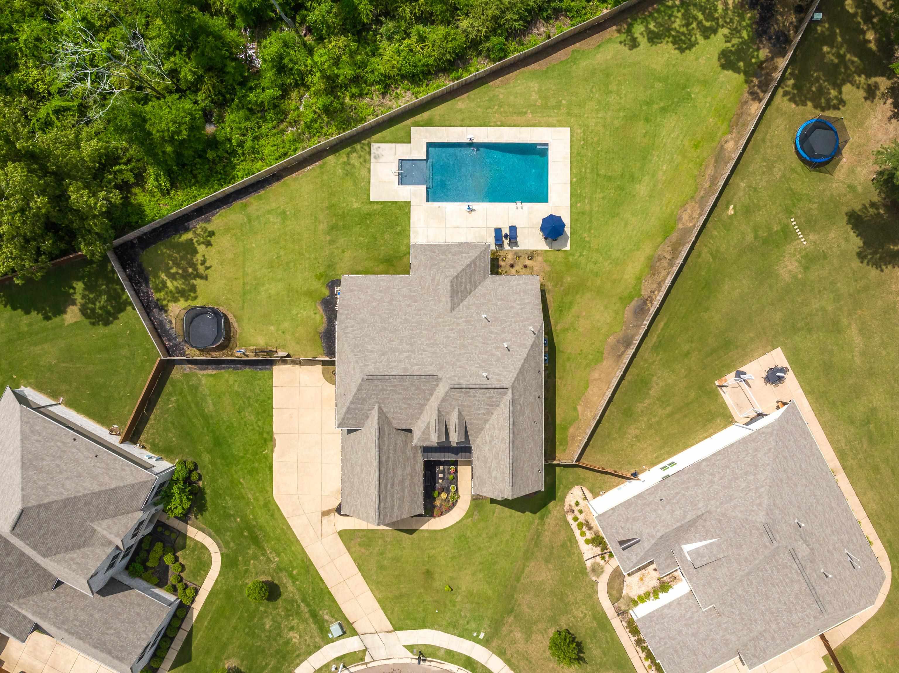 aerial view of a house with swimming pool