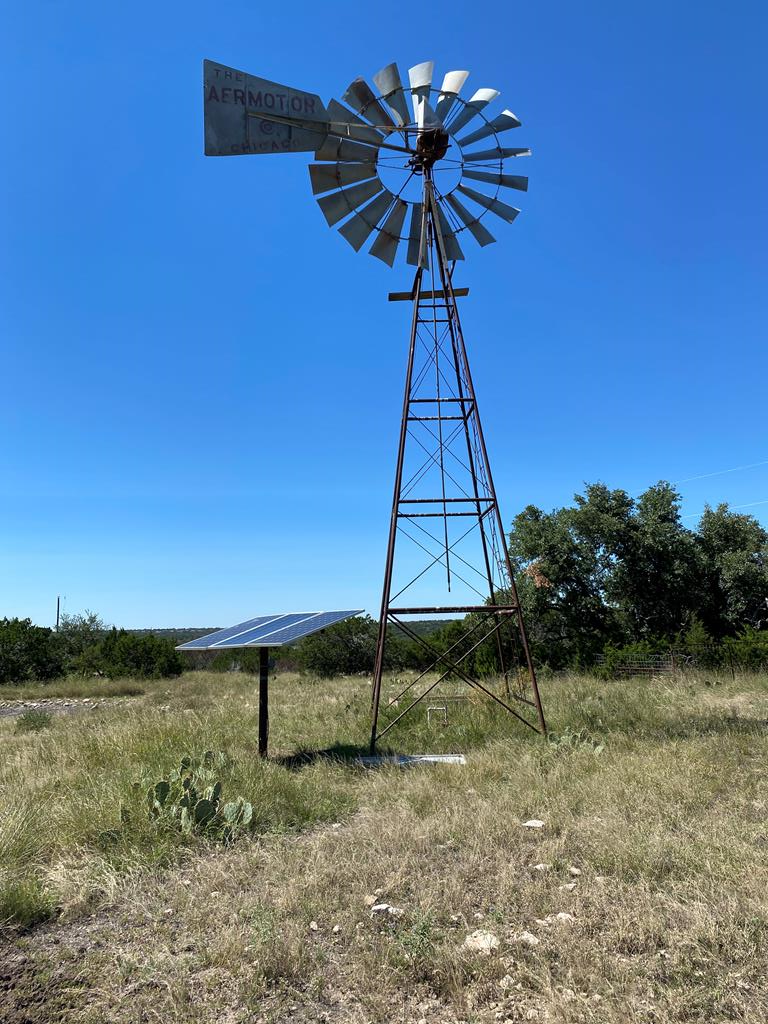 a flag is sitting in the middle of a field