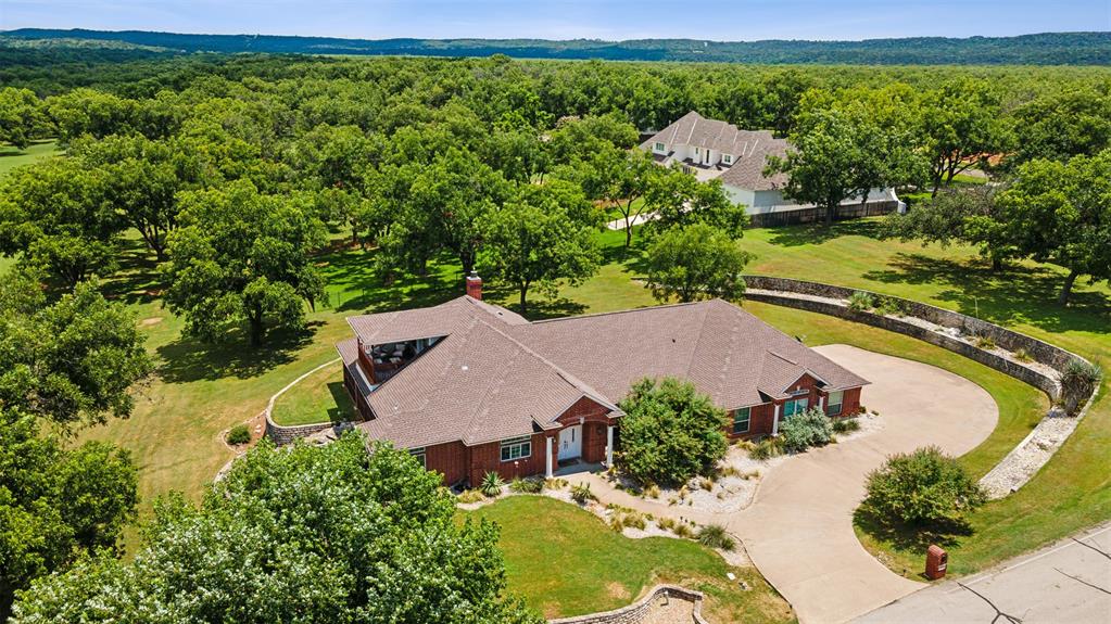 an aerial view of a house with a garden