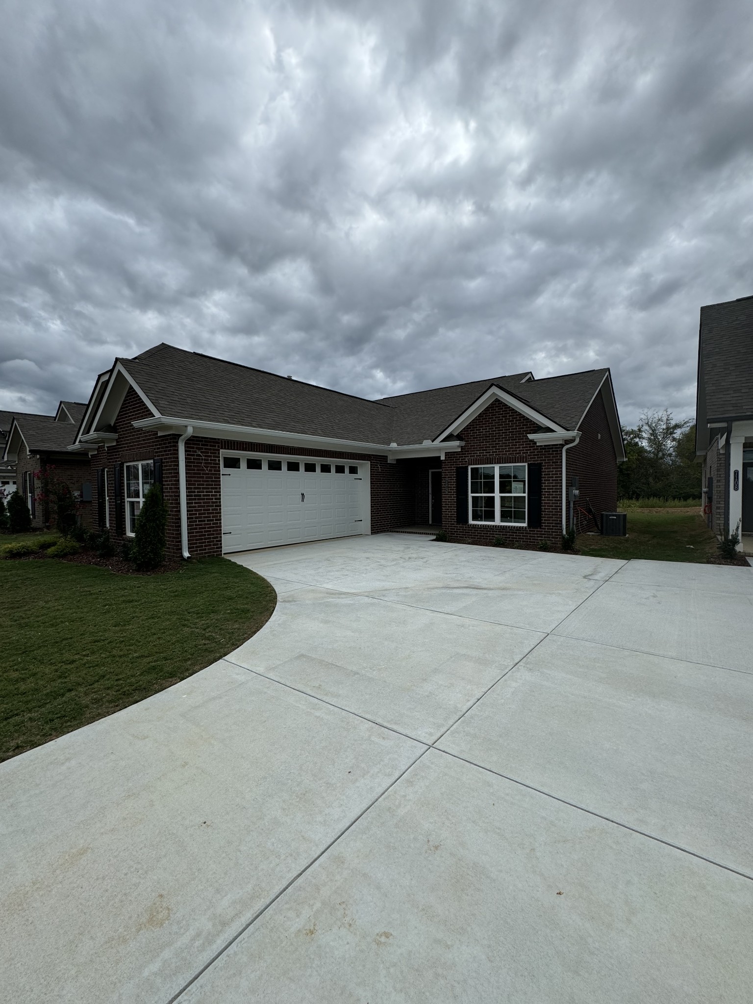 a view of house with outdoor space and street view