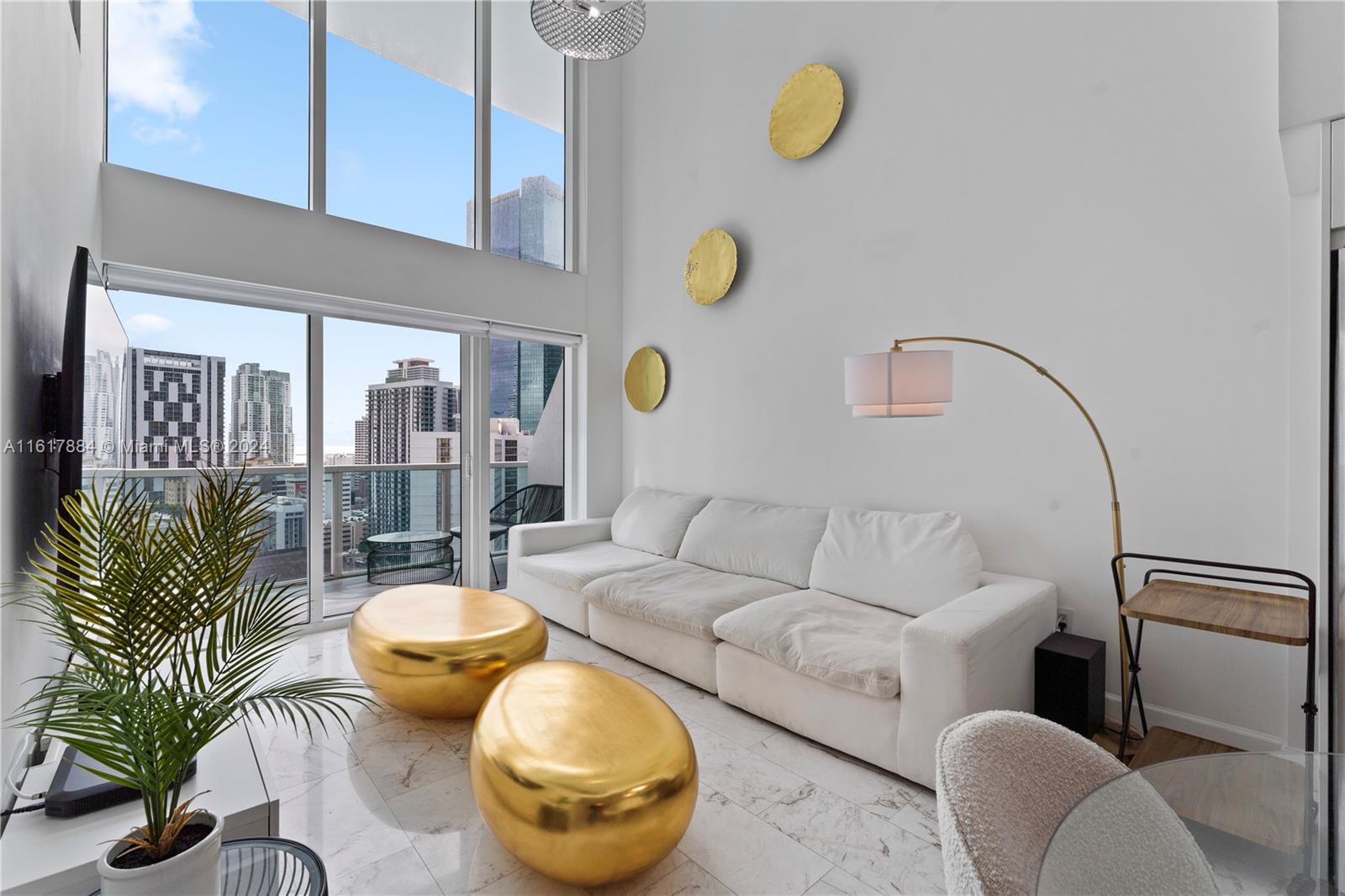 a living room with furniture and a rug