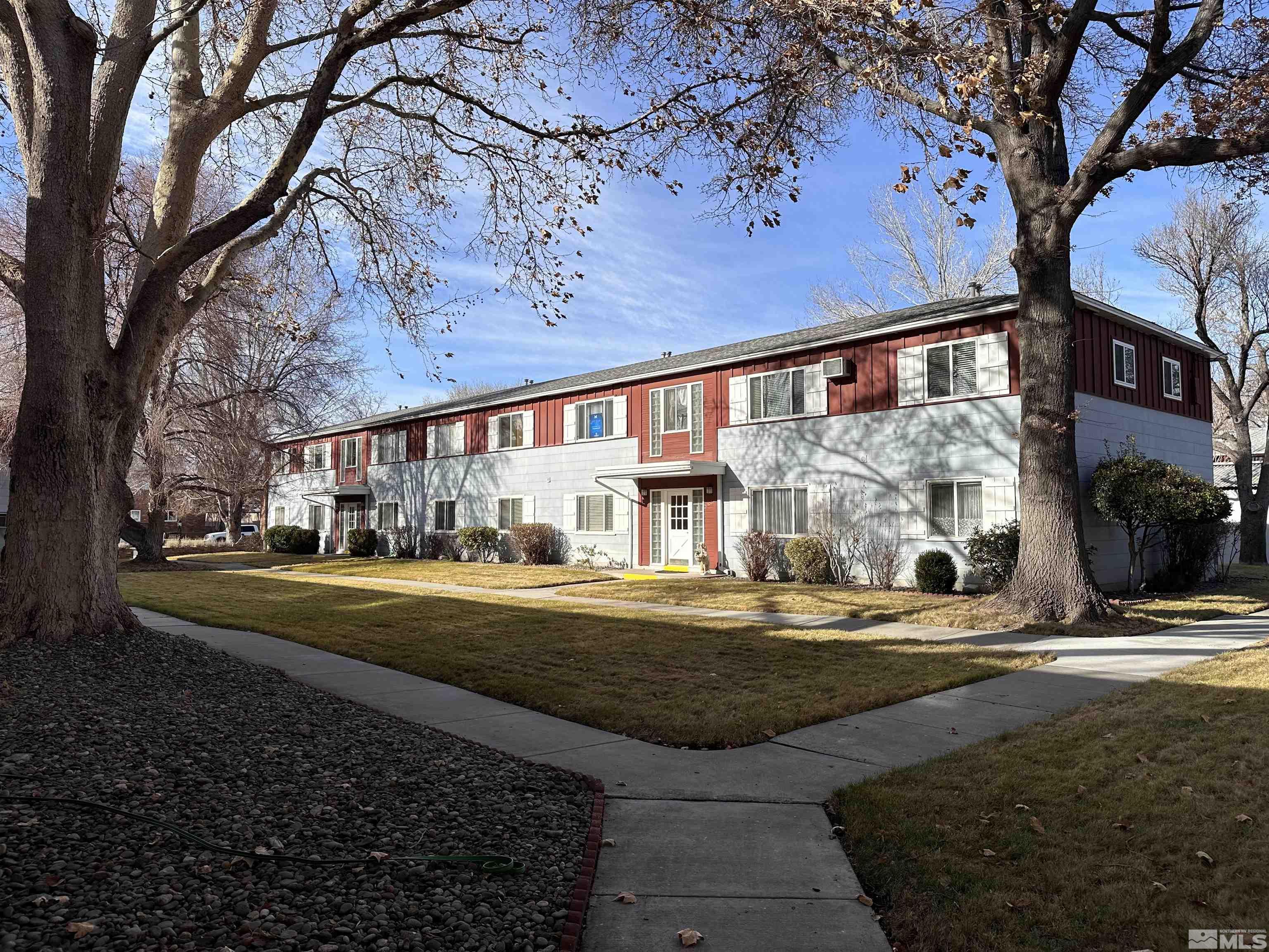 a front view of a building with street view