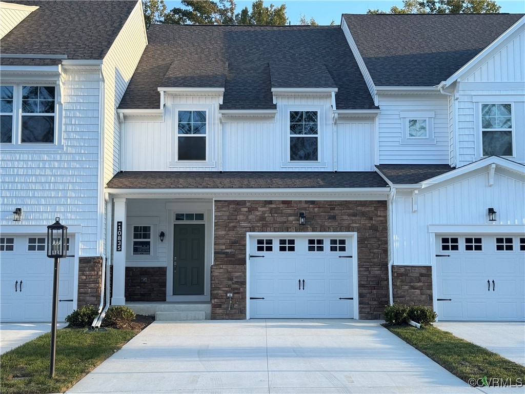 a front view of a house with yard