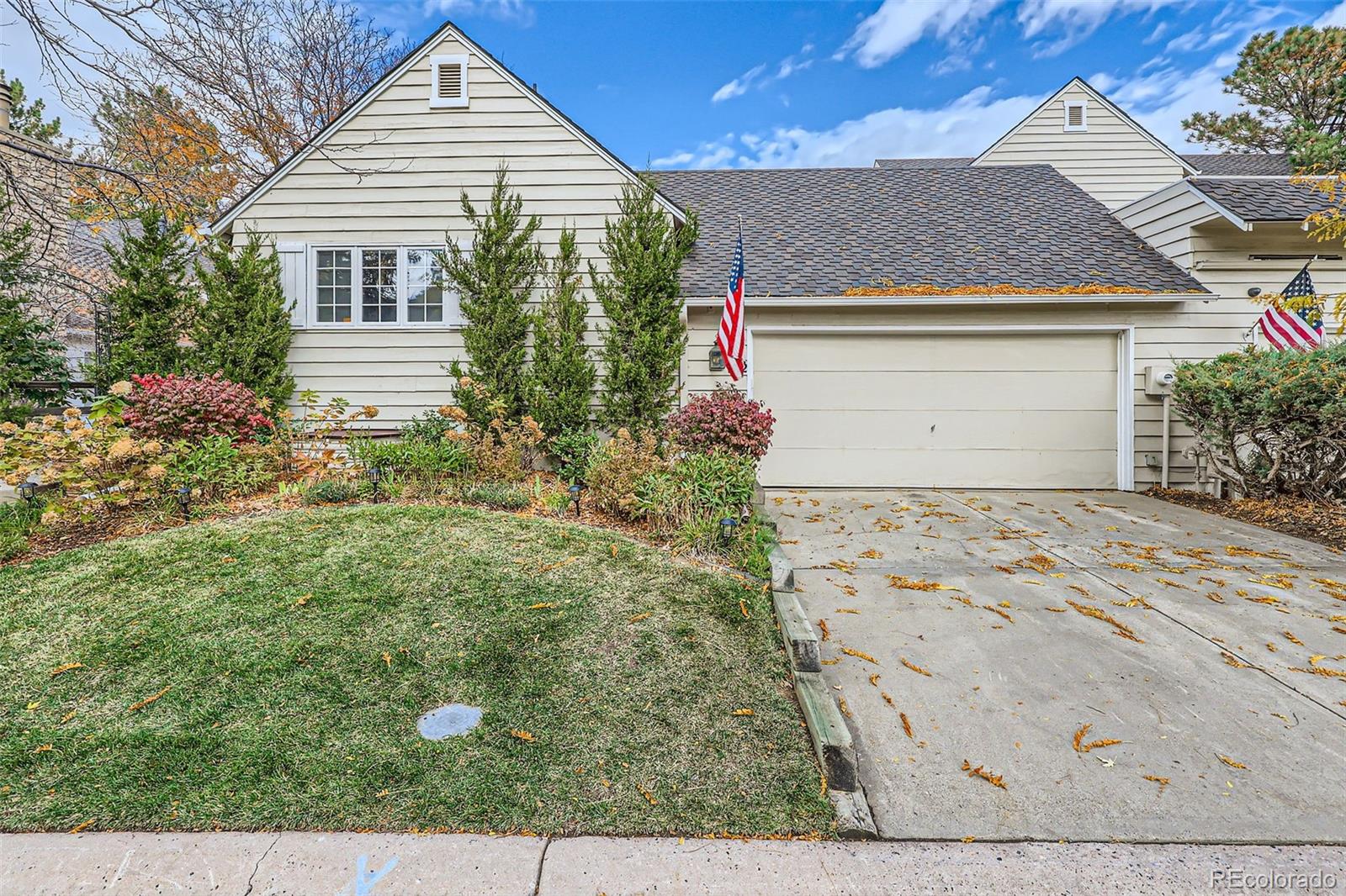 front view of a house with a yard