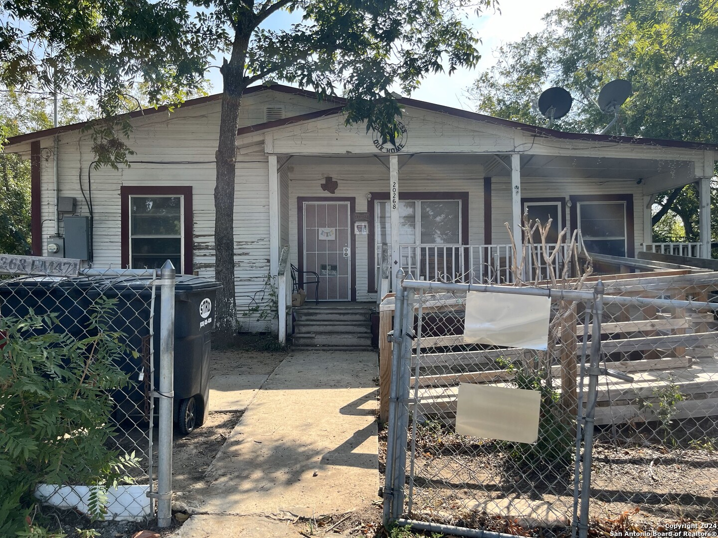 a front view of a house with a porch