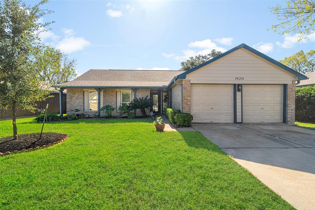 a view of outdoor space yard and front view of a house