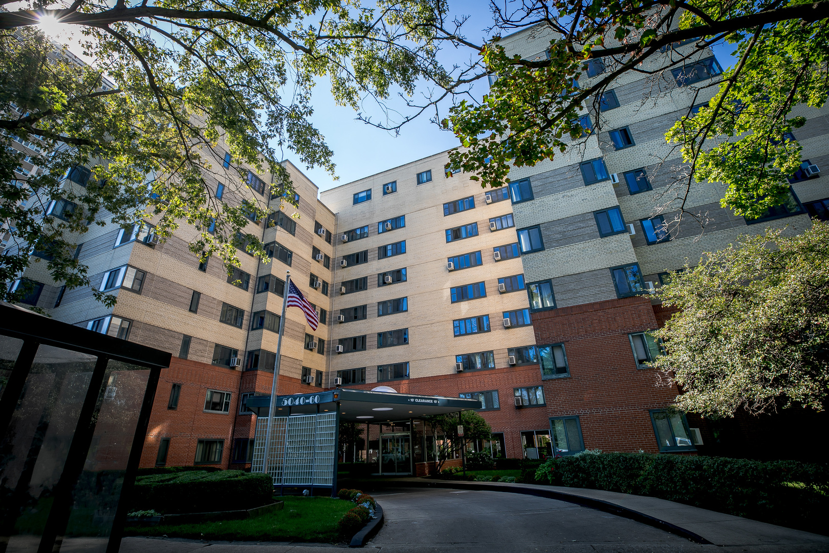 a front view of a building with garden