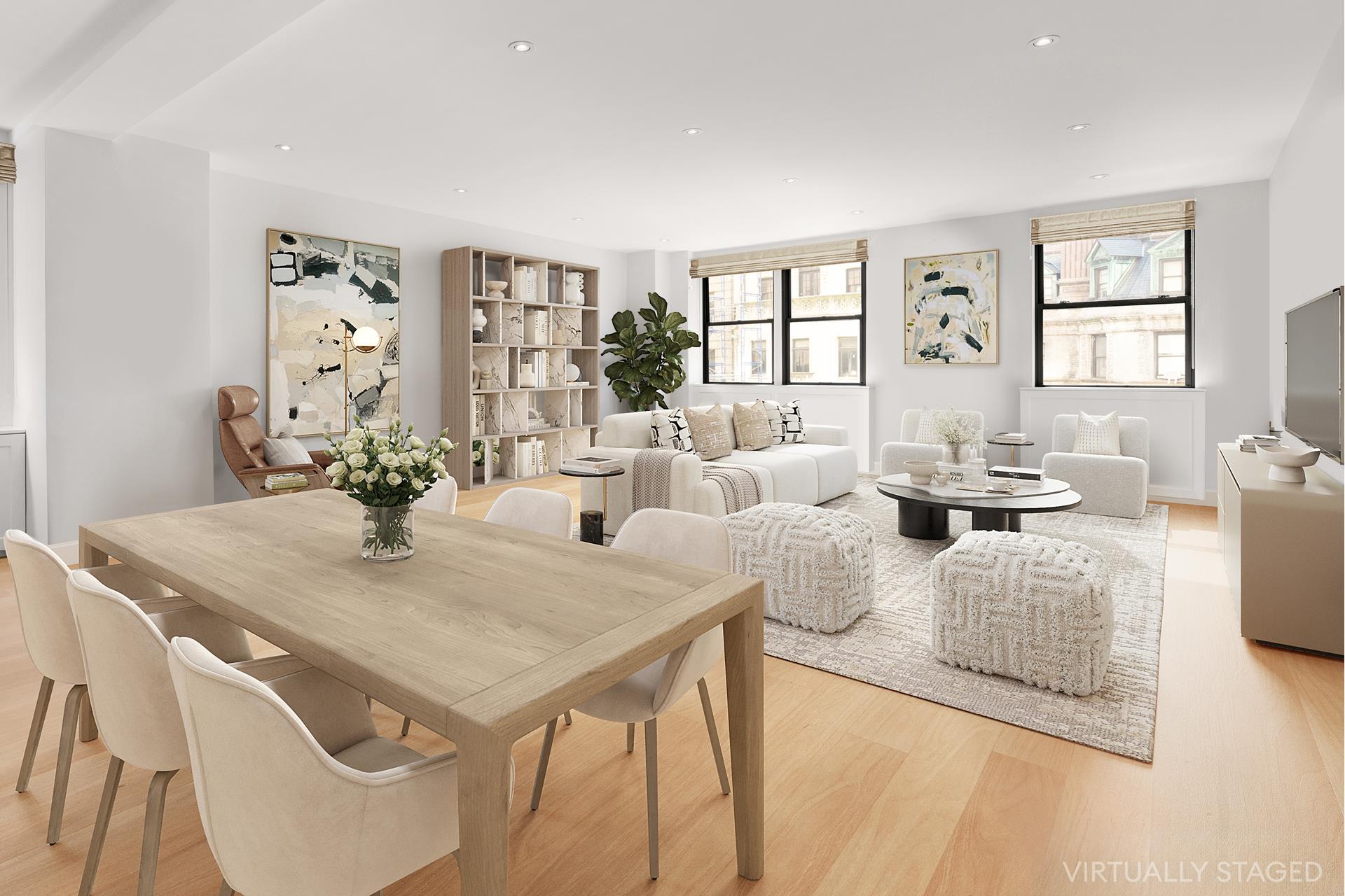 a view of a dining room with furniture and a potted plant