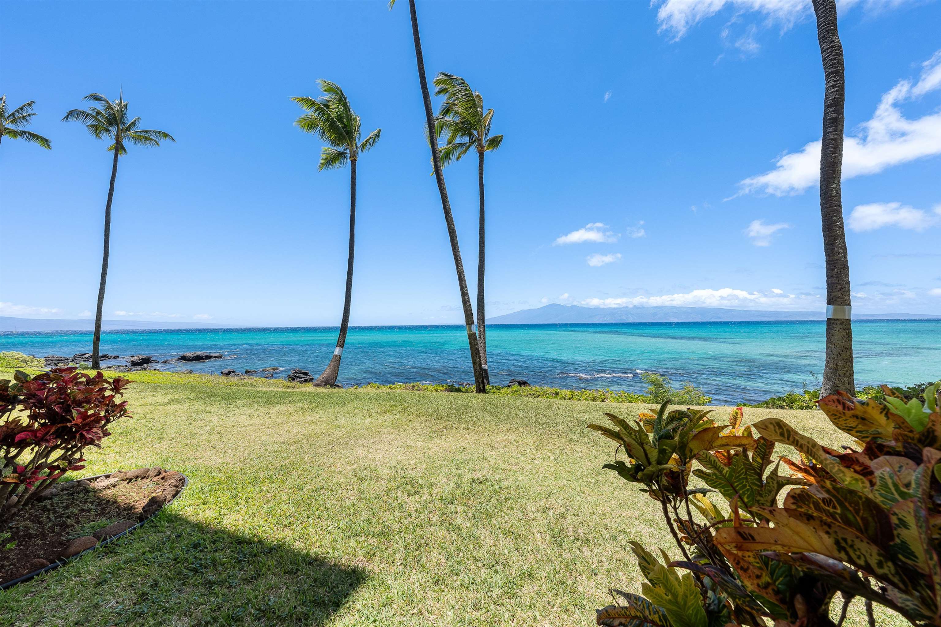 a house view with a ocean view