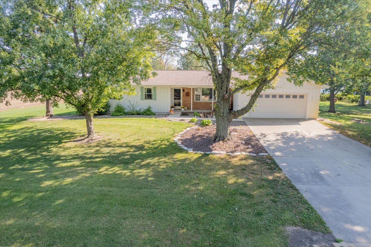 a house with trees in front of it