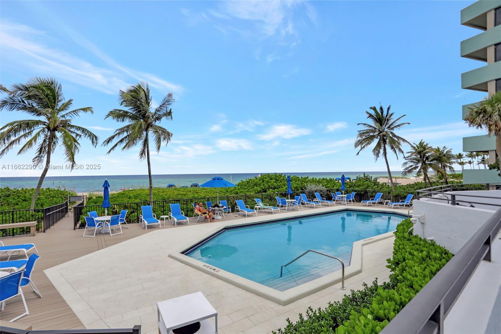 a view of outdoor space with palm trees