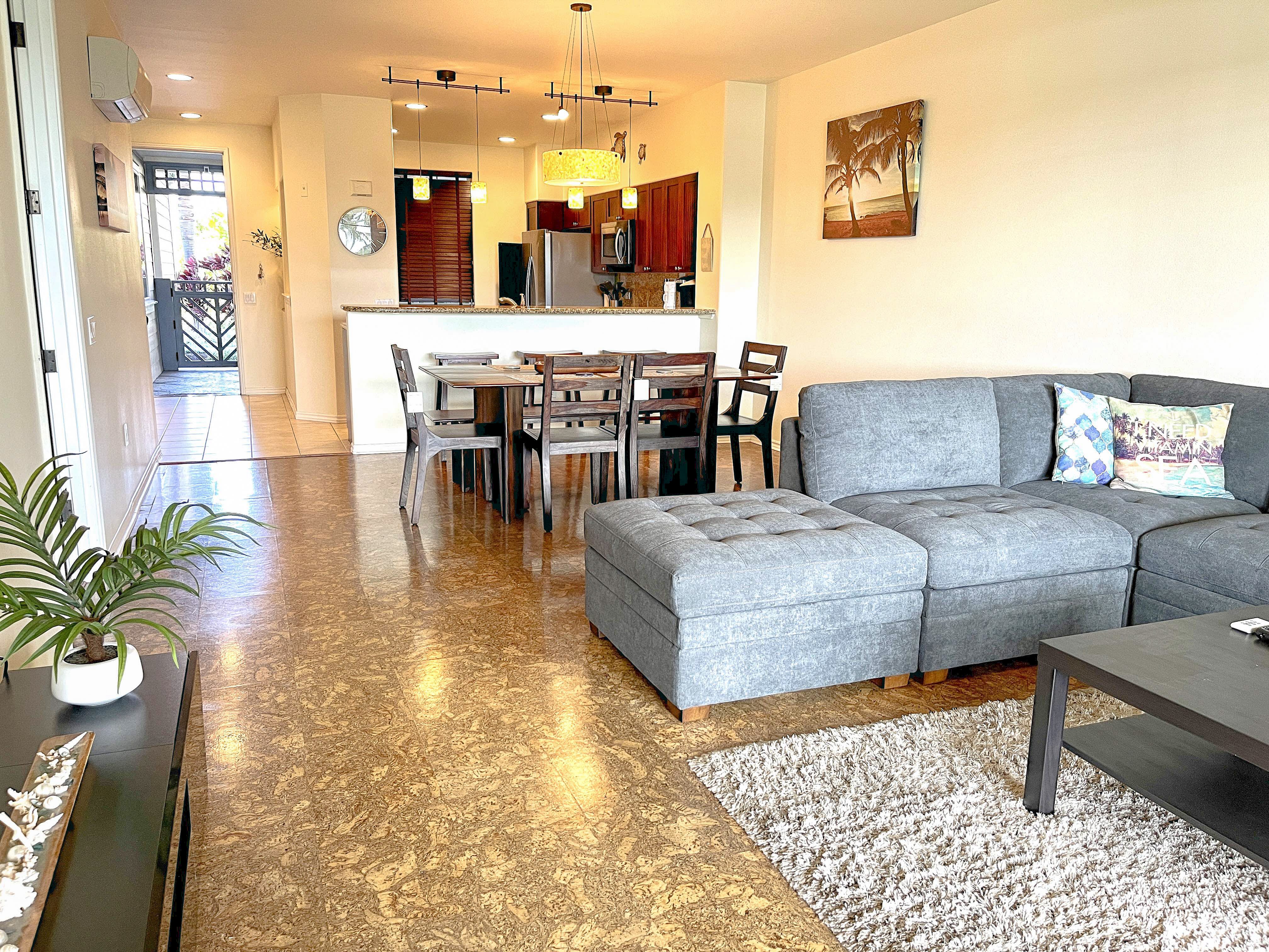 a living room with furniture and a table