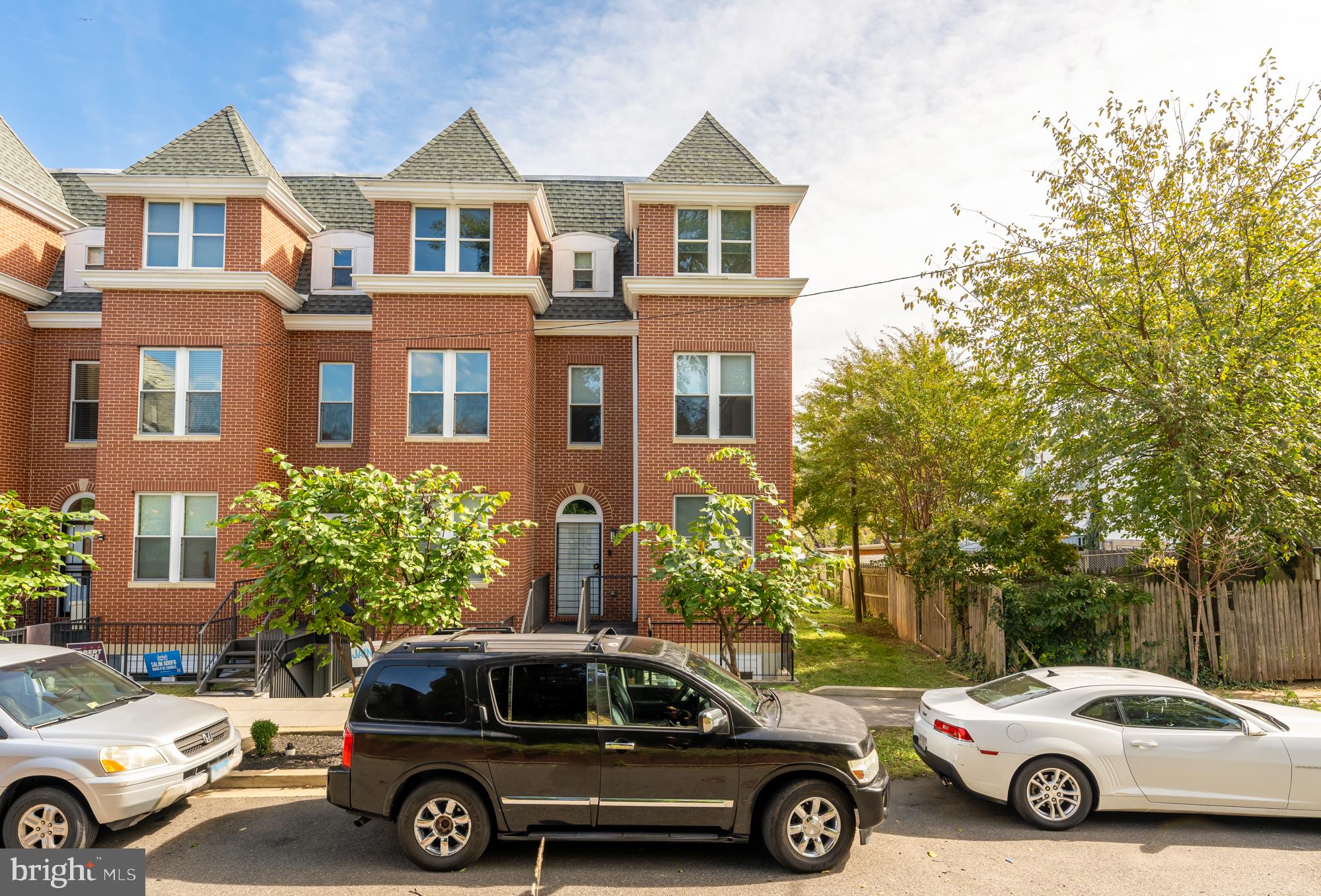 a car parked in front of a house