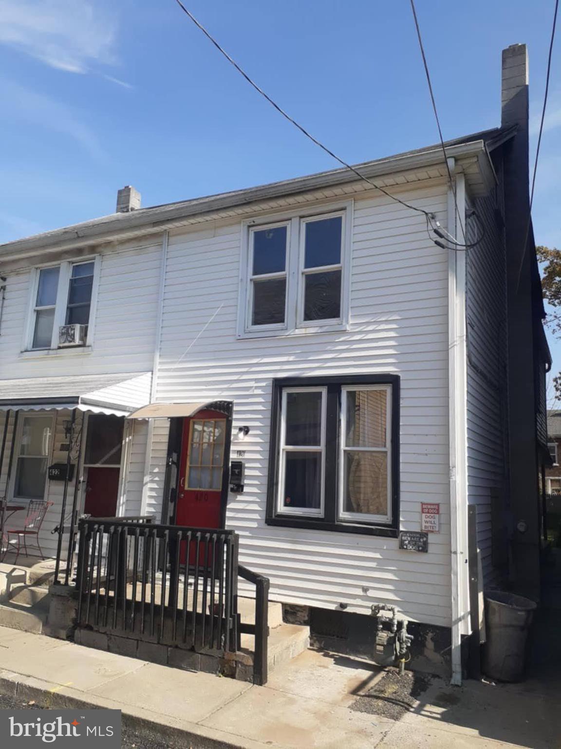 a view of a house with a porch