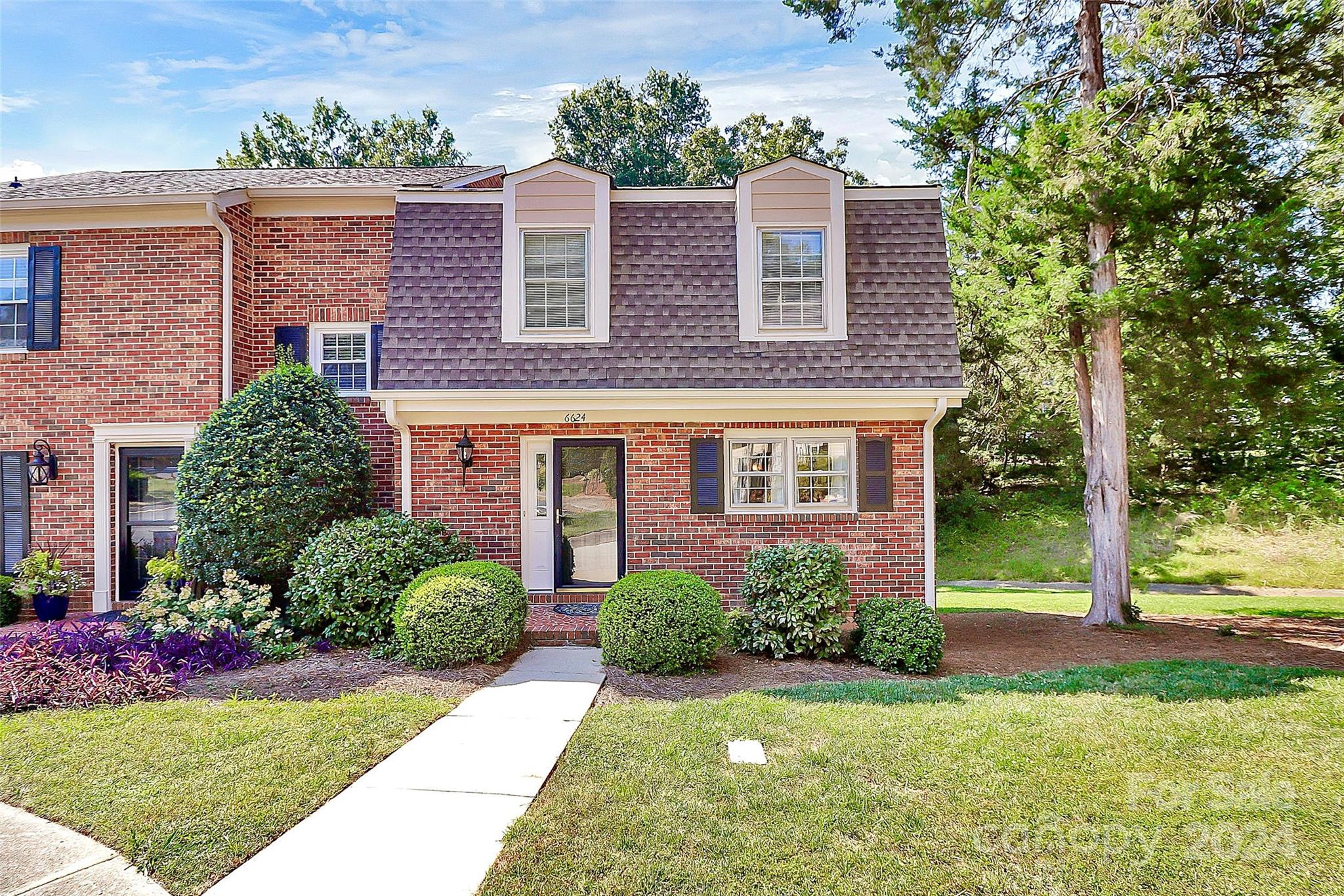 front view of house with a yard